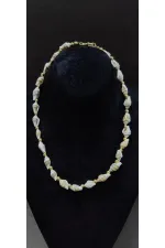 Collier pour femme avec détail coquillage