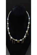 Collier pour femme avec détail œil et chaîne, perles