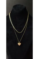 Collier à double chaîne dorée en forme de cœur