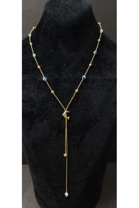 Collier minimaliste orné d'une figurine de dauphin et d'une perle œil protecteur.