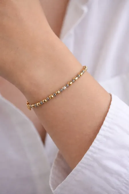 Bracelet élégant orné de perles bicolores