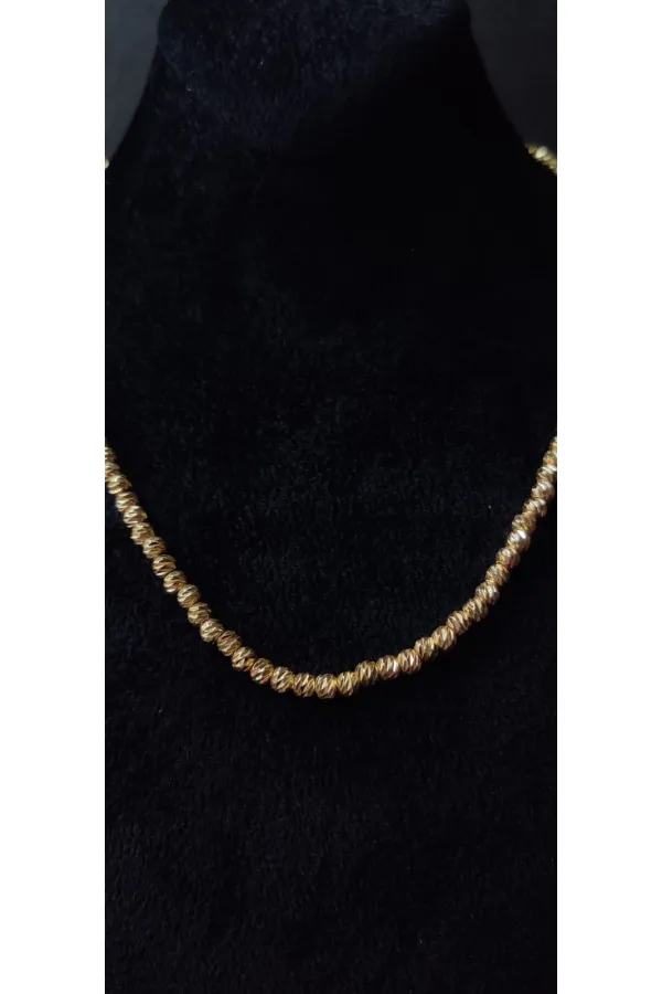 Minimalist Necklace with Gold-Look Bead Details