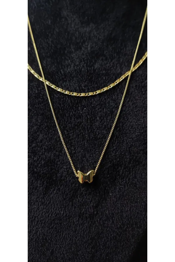 Collier double chaîne en or avec motif papillon