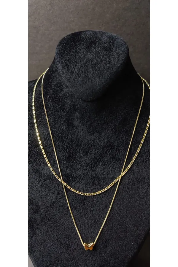 Collier double chaîne en or avec motif papillon