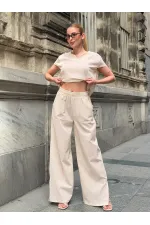 Women's Cream-Colored, Relaxed Fit Linen Top and Bottom Set with Tassel Detail HZL26S-VL14181