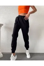 Pantalon de survêtement noir à poches et taille élastique 3 fils pour femme HZL24W-ZK12321