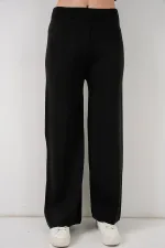 Ensemble deux pièces pour femme : cardigan, pantalon et tricot 15956 - Noir
