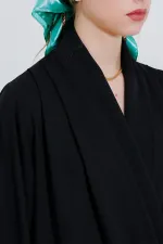 Chemisier drapé en satin noir à col cache-cœur pour femme 0492