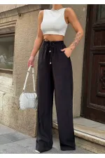 Kadın Siyah Yüksel Bel Lastikli Beli Bağlamalı Cepli Geniş Paça Pantolon HZL24S-VL191151