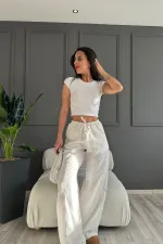 Kadın Beyaz Cepli Beli Lastikli Bol Paça Keten Pantolon HZL24S-ZK11051