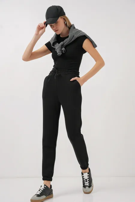 Pantalon de survêtement 55450 à trois fils - Noir