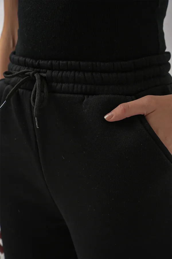 Pantalon de survêtement 55450 à trois fils - Noir