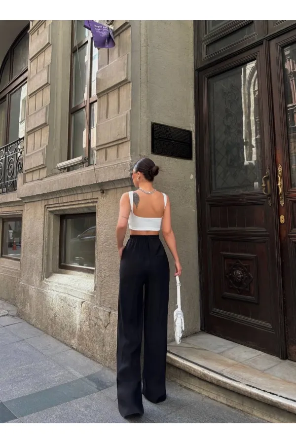 Kadın Siyah Yüksel Bel Lastikli Beli Bağlamalı Cepli Geniş Paça Pantolon HZL24S-VL191151