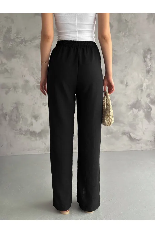 Kadın Siyah Lastikli Bel Yırtmaç Detaylı Cepsiz İthal Keten Astarsız Pantolon HZL24S-FRY121941