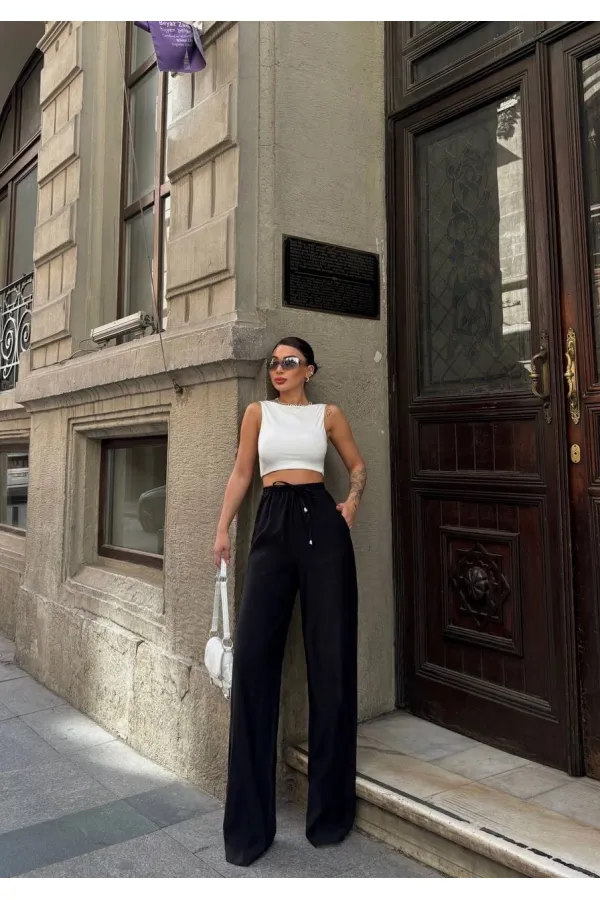 Kadın Siyah Yüksel Bel Lastikli Beli Bağlamalı Cepli Geniş Paça Pantolon HZL24S-VL191151