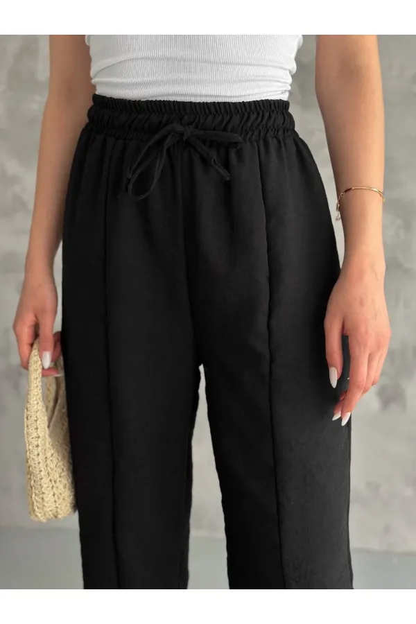 Kadın Siyah Lastikli Bel Yırtmaç Detaylı Cepsiz İthal Keten Astarsız Pantolon HZL24S-FRY121941