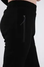 Pantalon de jogging noir pour garçon Tommylife, avec poche zippée, coupe standard et ourlets resserrés - 64042