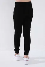 Pantalon de jogging noir pour garçon Tommylife, avec poche zippée, coupe standard et ourlets resserrés - 64042