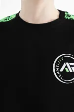 T-shirt garçon imprimé Tommylife Wholesale, taille serveur, col rond, coupe standard, référence 11121, noir