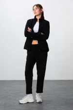 Ensemble de survêtement en polaire Tommylife Wholesale pour femme, coupe classique, col montant, taille oversize, noir, référence 95339