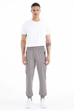 Pantalon de survêtement basique pour homme Tommylife Wholesale avec poches, cordon de serrage, coupe confortable et ourlet élastiqué - 84826