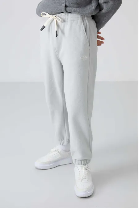 Pantalon de jogging en polaire Tommylife Wholesale Waiter Boy, coupe standard, pour garçon, couleur pierre (réf. 11220).