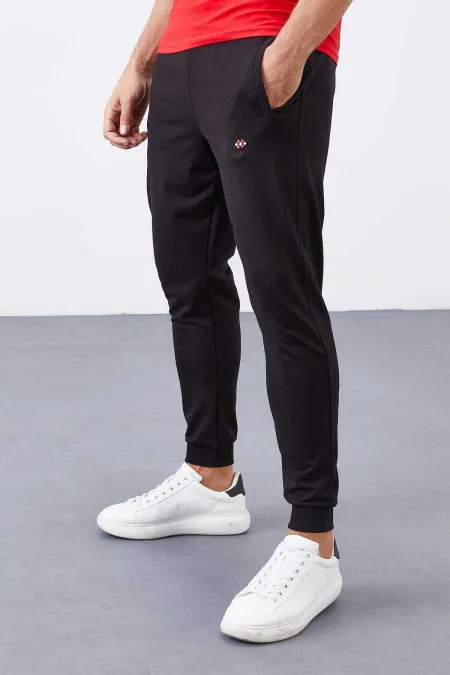 Pantalon de jogging slim noir pour homme Tommylife, avec poches zippées - 84343