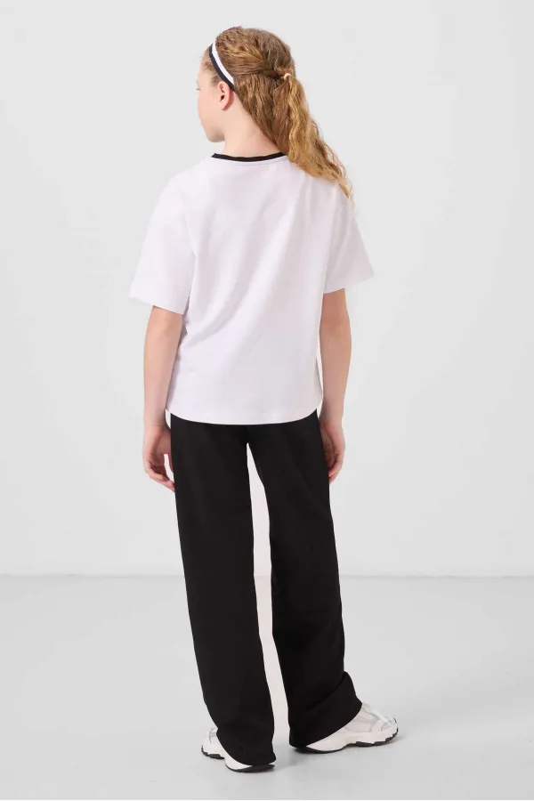 Ensemble de survêtement palazzo Tommylife Wholesale pour filles, col rond, imprimé, jambes larges, coupe standard, blanc et noir, référence 75171