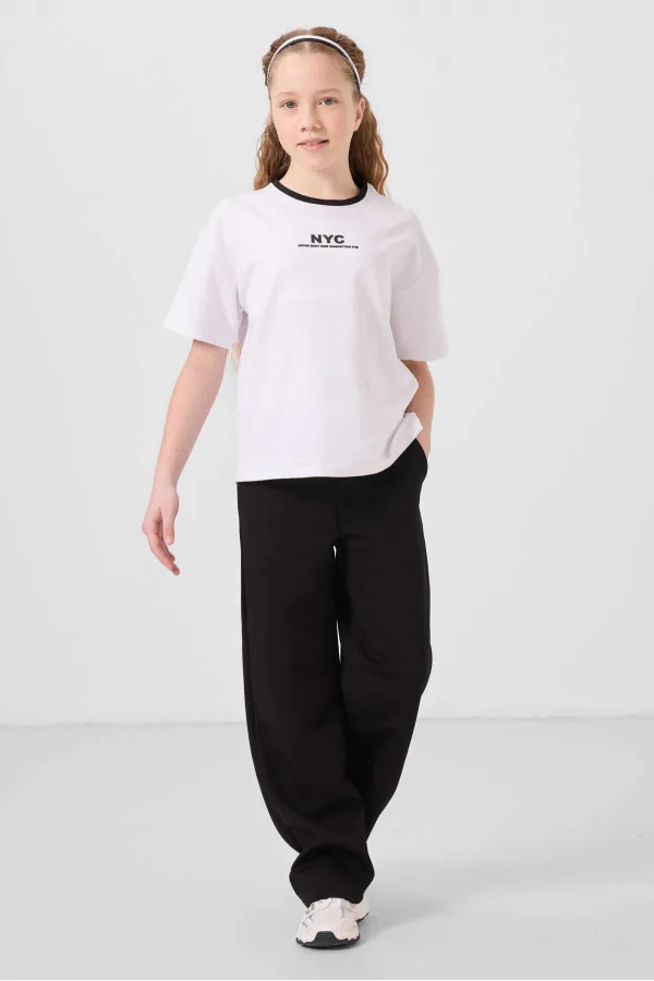 Ensemble de survêtement palazzo Tommylife Wholesale pour filles, col rond, imprimé, jambes larges, coupe standard, blanc et noir, référence 75171