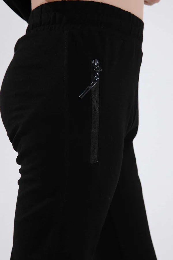 Pantalon de jogging noir pour garçon Tommylife, avec poche zippée, coupe standard et ourlets resserrés - 64042