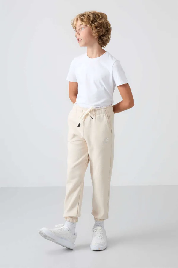 Pantalon de jogging Tommylife Wholesale Waiter Boy, coupe standard, pour garçon, référence 11225, beige.