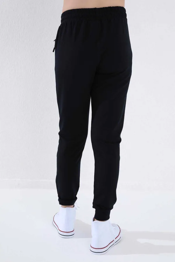 Pantalon de jogging Tommylife bleu marine pour garçon, coupe standard, avec poches zippées et revers - 64042