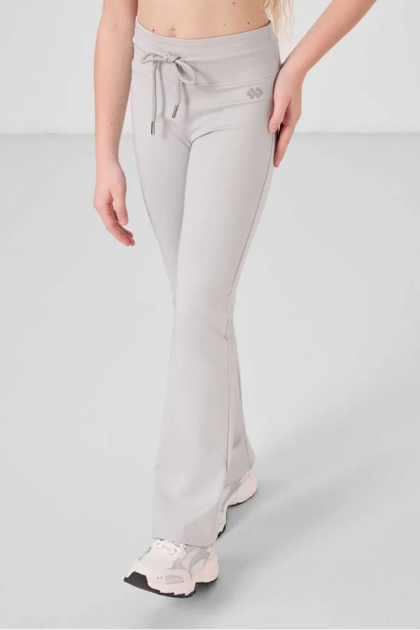 Leggings Tommylife Wholesale pour filles, coupe standard flexible, style basique, jambes évasées, couleur pierre (réf. 75193).