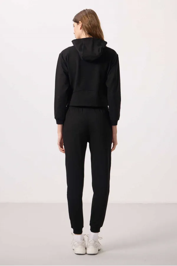 Ensemble de survêtement Tommylife Wholesale pour femme, à capuche et fermeture éclair, coupe oversize - 95328 Noir