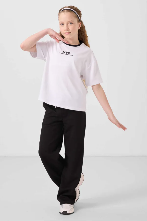 Ensemble de survêtement palazzo Tommylife Wholesale pour filles, col rond, imprimé, jambes larges, coupe standard, blanc et noir, référence 75171