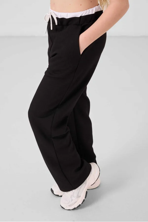 Ensemble de survêtement palazzo Tommylife Wholesale pour filles, col rond, imprimé, jambes larges, coupe standard, blanc et noir, référence 75171