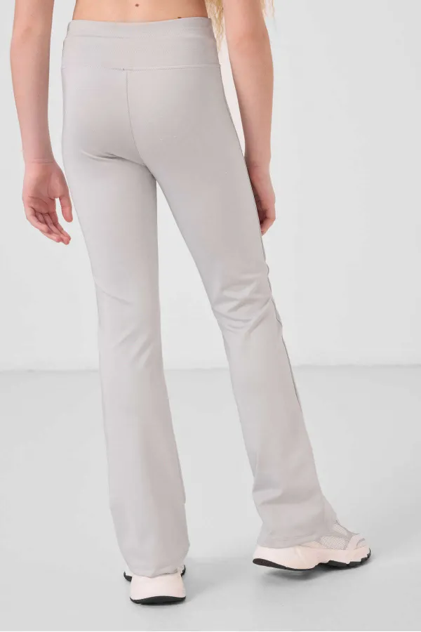 Leggings Tommylife Wholesale pour filles, coupe standard flexible, style basique, jambes évasées, couleur pierre (réf. 75193).