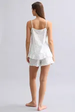 Débardeur blanc à fines bretelles en voile pour femme égyptienne