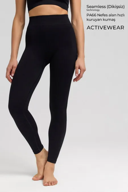 Leggings de sport Carlotta sans coutures côtelés noirs pour femme