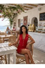 Ensemble gilet et jupe orné de strass.