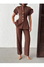 ENSEMBLE DE DÉTAILS À VOLANTS D'ÉPAULE