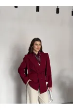 VESTE AVEC CEINTURE D'ÉPAULE ET MANCHES TOMBASES