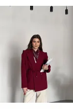 VESTE AVEC CEINTURE D'ÉPAULE ET MANCHES TOMBASES